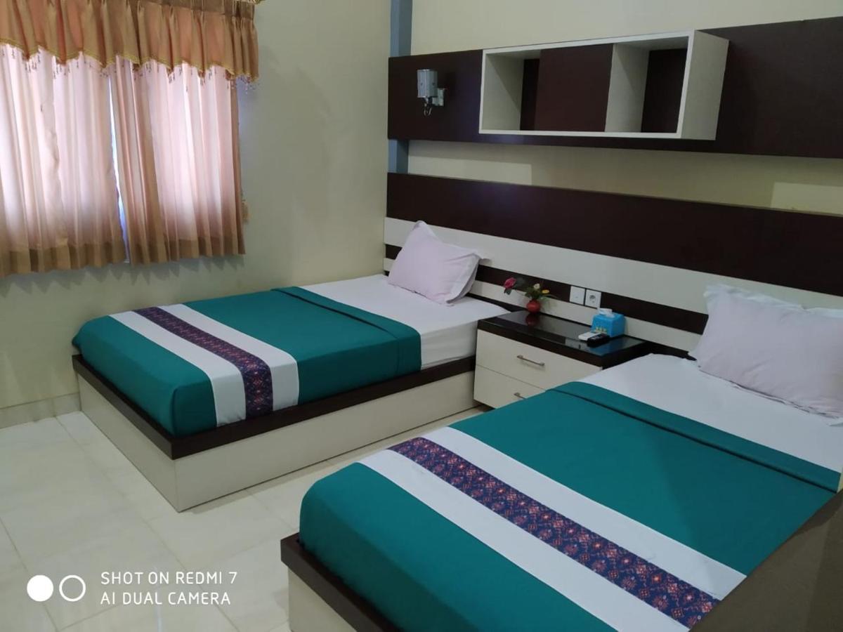 Hotel Pilar Mosa Muarawahau Kültér fotó